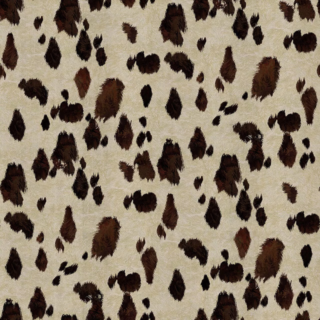Warm cream upholstery fabric with scattered shaggy brown and black animal-print markings