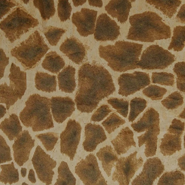 Warm brown giraffe patches on a cream ground with a softly textured surface