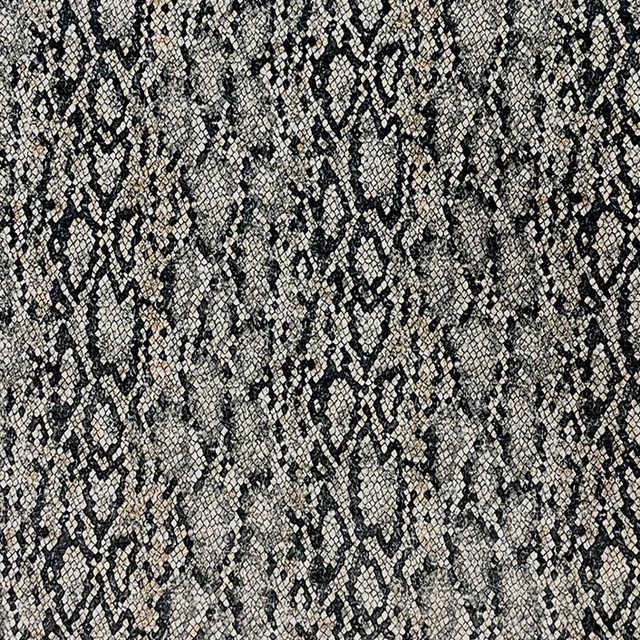 Charcoal, grey and cream snakeskin fabric with a mottled, tactile woven surface