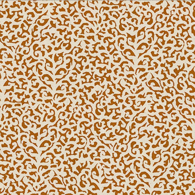 Dense ivory scrollwork over a warm rust-brown ground on a fabric swatch