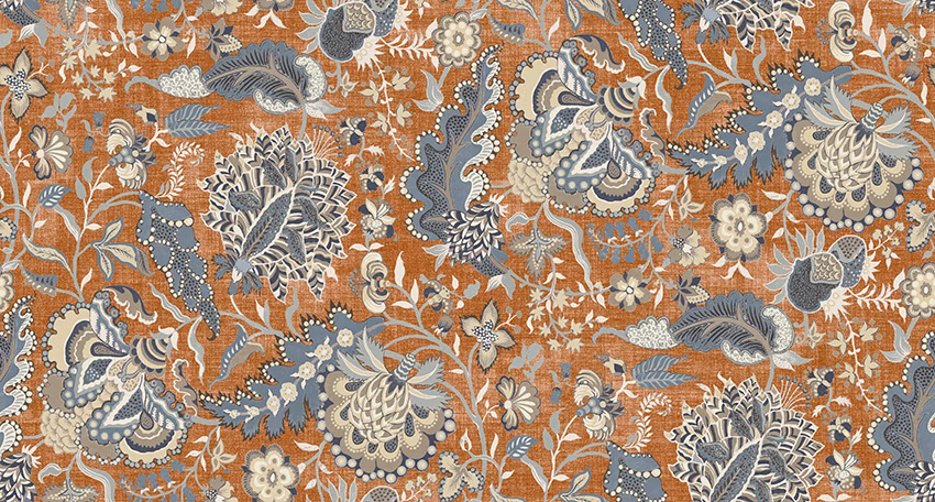 Rust floral and paisley textile with blue-grey and cream botanical detail