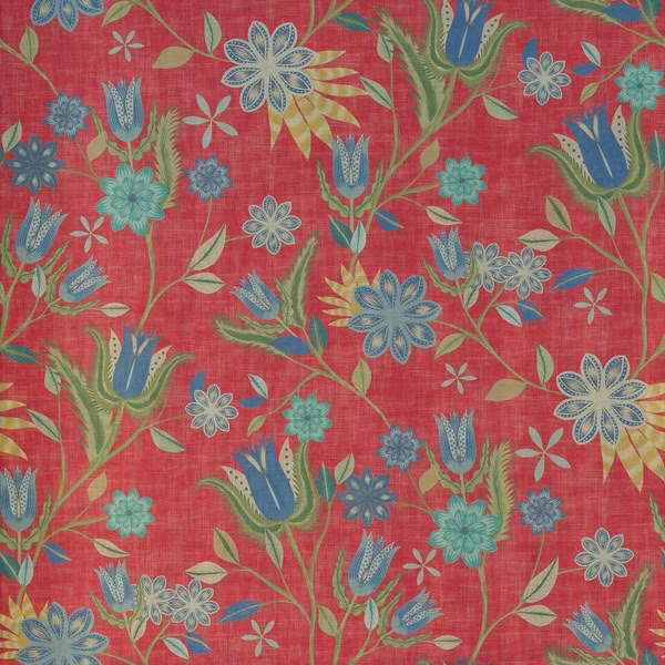 Coral-red botanical fabric with blue tulips, teal flowers and green leafy stems