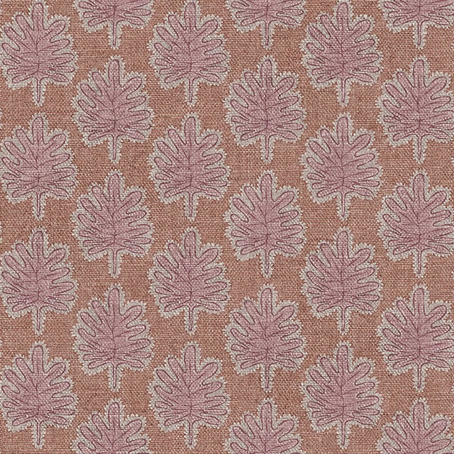 Dusty mauve leaf motifs outlined in pale yarn across a terracotta woven ground