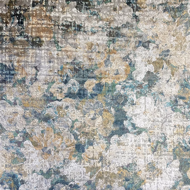 Blue-grey abstract floral textile with cream, taupe and ochre distressed texture