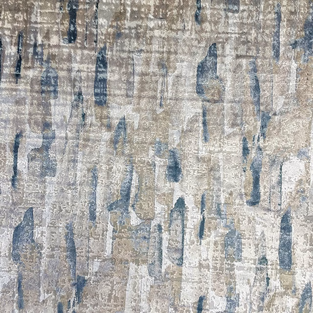 Stone grey textile with distressed blue vertical strokes and a tactile painterly weave