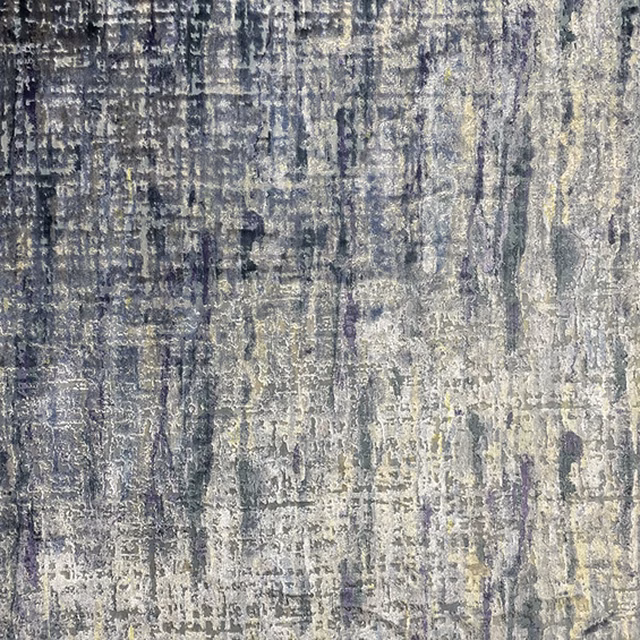 Cool grey Lecco fabric with distressed vertical striations and shimmering ivory flecks