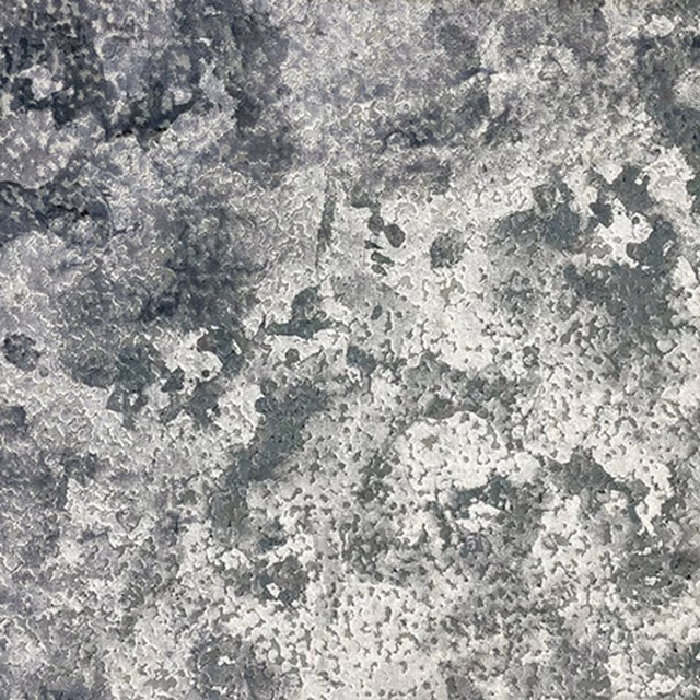 Silver and charcoal grey mottled fabric with a cloudy mineral texture