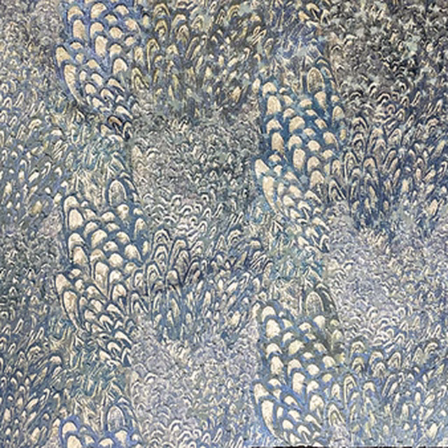 Muted blue-grey fabric with pale clustered botanical motifs and a richly textured surface