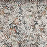 Pale stone textured fabric with blush, sage, rust and charcoal mottling