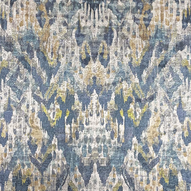 Blue-grey, cream and olive woven textile with mirrored ikat-style vertical motifs