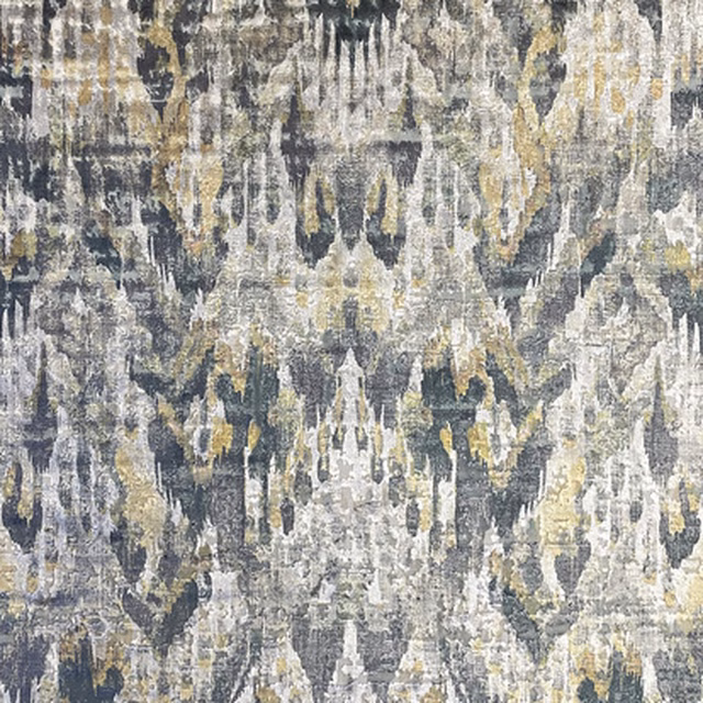 Charcoal and stone ikat-inspired vertical motifs with muted ochre accents on textured fabric