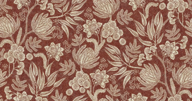Burgundy botanical textile with ivory flowers, curling leaves and a lightly textured ground