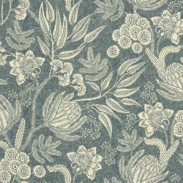 Muted blue-grey floral fabric with cream leaves and clustered botanical flowers