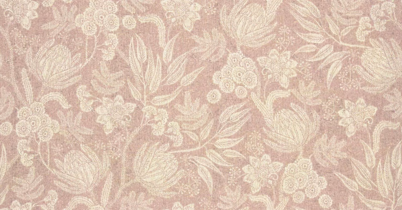 Dusty blush pink woven fabric with ivory trailing flowers, leaves and clustered botanical motifs