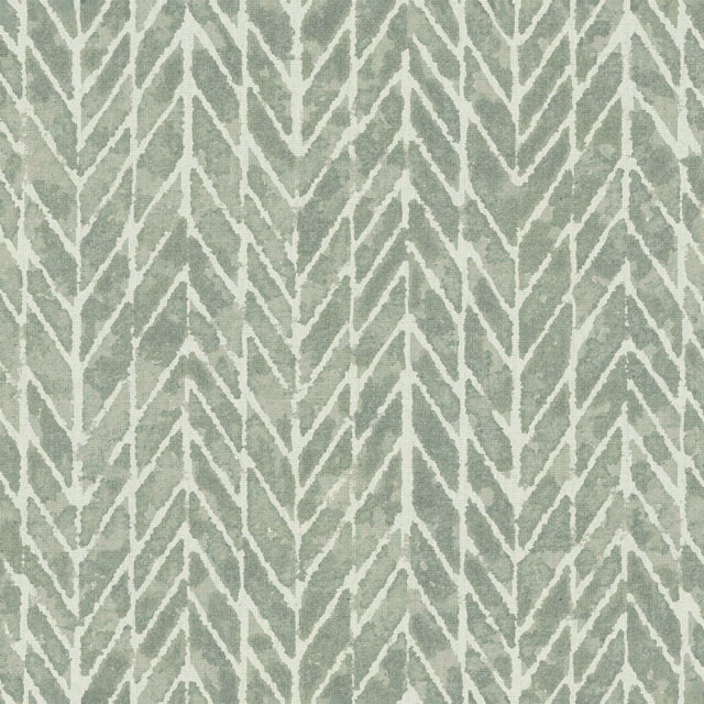 Soft sage-green fabric with ivory branching chevrons and a mottled woven texture
