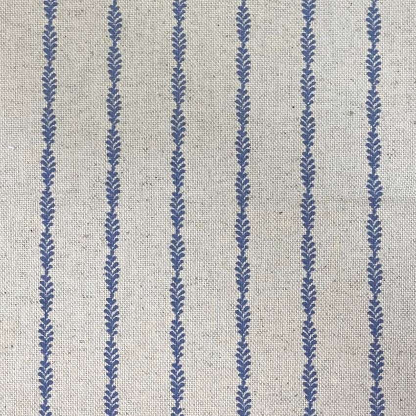 Cream-grey woven fabric with repeated chalky blue leafy vertical stripes