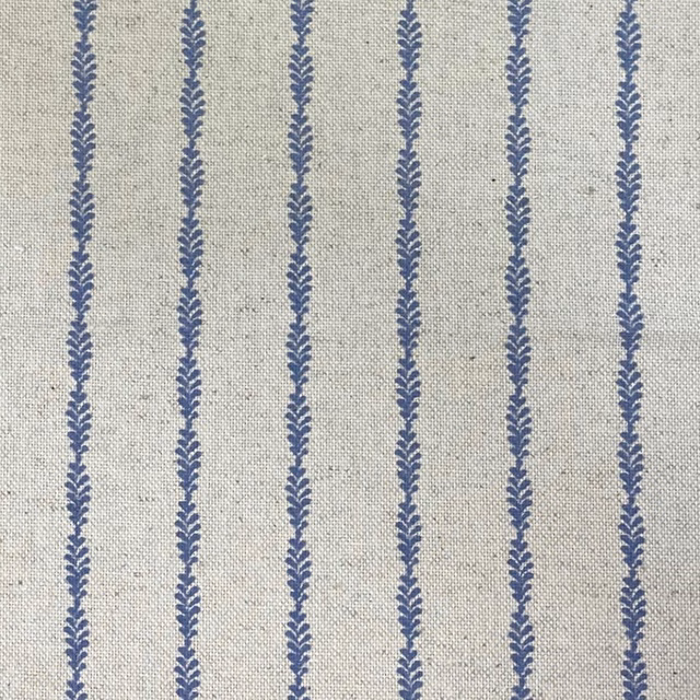 Cream-grey woven fabric with repeated chalky blue leafy vertical stripes