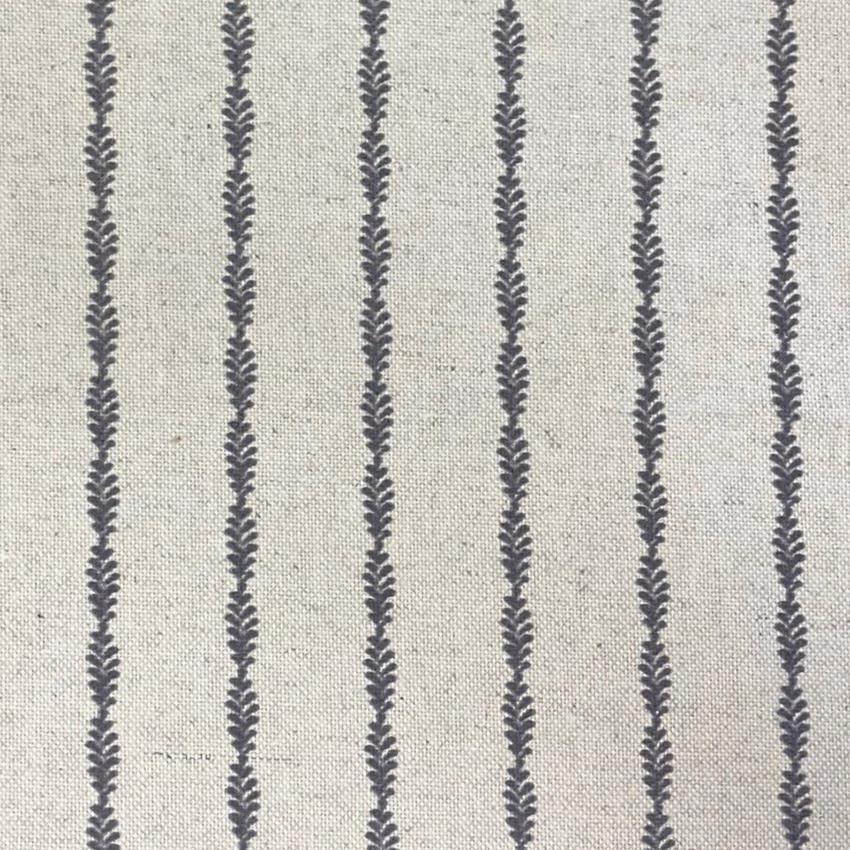 Pale stone-grey woven fabric with repeated charcoal leaf-like vertical stripes