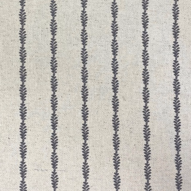 Pale stone-grey woven fabric with repeated charcoal leaf-like vertical stripes