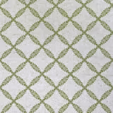Pale olive diamond trellis with leafy edges on a softly flecked neutral weave