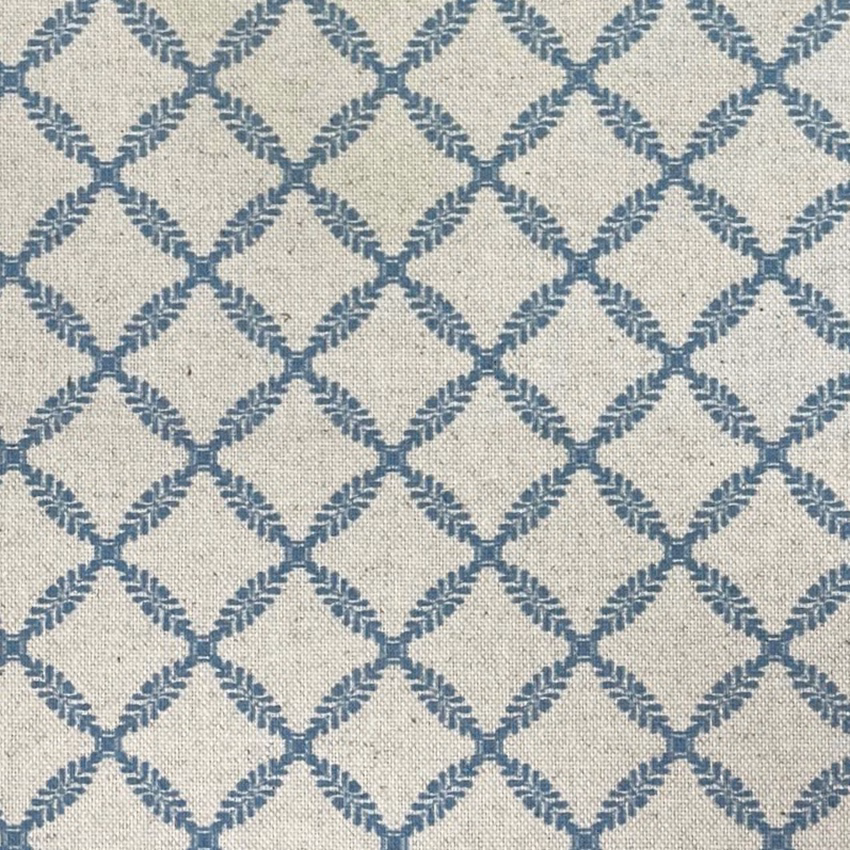 Ivory woven fabric with a cool blue diamond lattice and gently slubbed texture