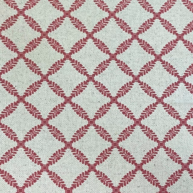 Pale sage-mint woven ground with muted raspberry diamond lattice motif