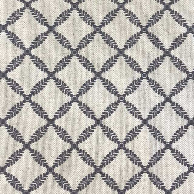 Pale greige woven ground with charcoal leaf-edged diamond trellis pattern
