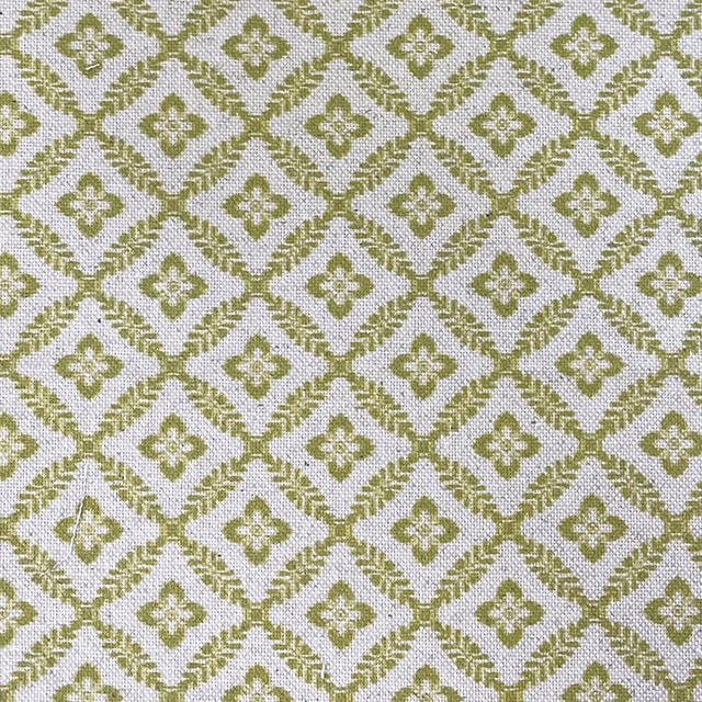 Cream woven swatch with muted kiwi olive diamonds and quatrefoil motifs