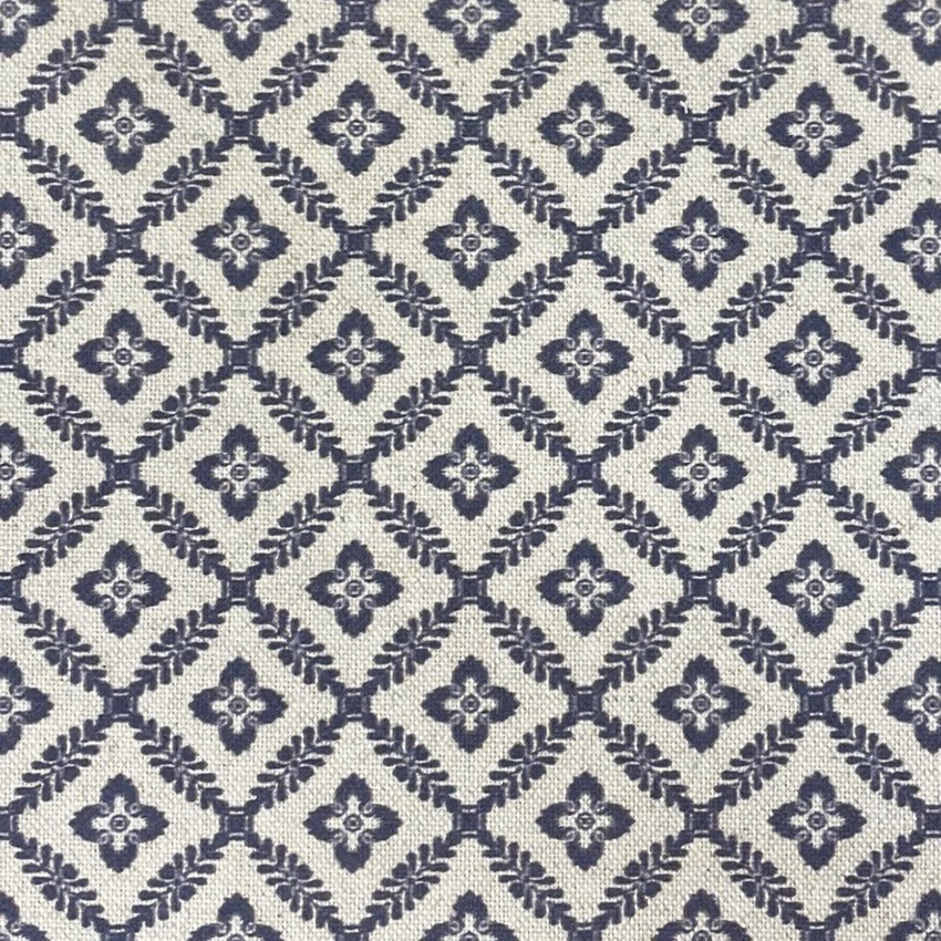 Cream woven ground with navy diamond trellis and small quatrefoil motifs