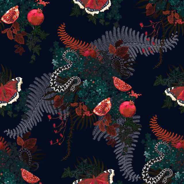 Midnight navy fabric with pomegranates, serpents, ferns and jewel-toned botanical clusters