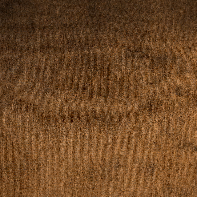 Close view of Dandy 8’s dense russet-brown weave with softly clouded tonal shading