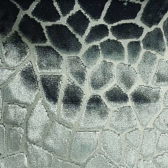 Cool grey and charcoal irregular mosaic weave with raised silvery outlines