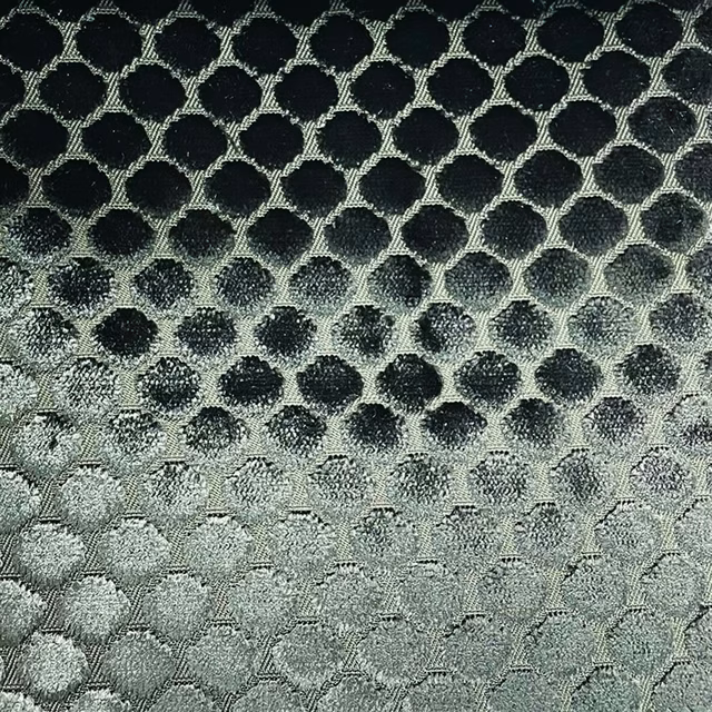 Charcoal to silver grey woven spot lattice with softly textured rounded motifs