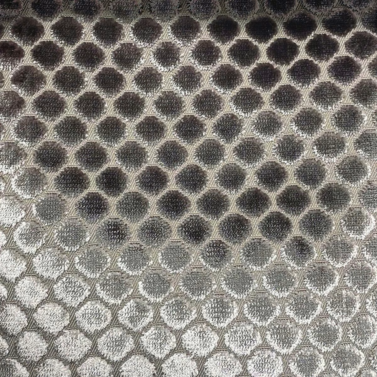 Textured charcoal and silver grey fabric with rounded spots in a diamond grid