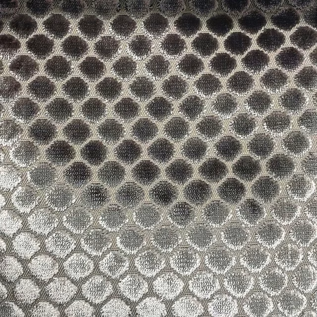 Textured charcoal and silver grey fabric with rounded spots in a diamond grid