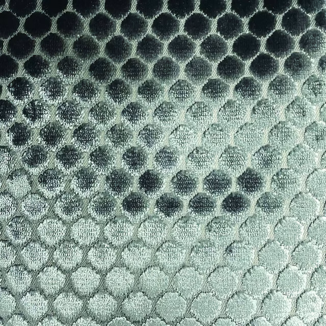 Cool sage and charcoal spot weave fading from dark upper to pale lower tones