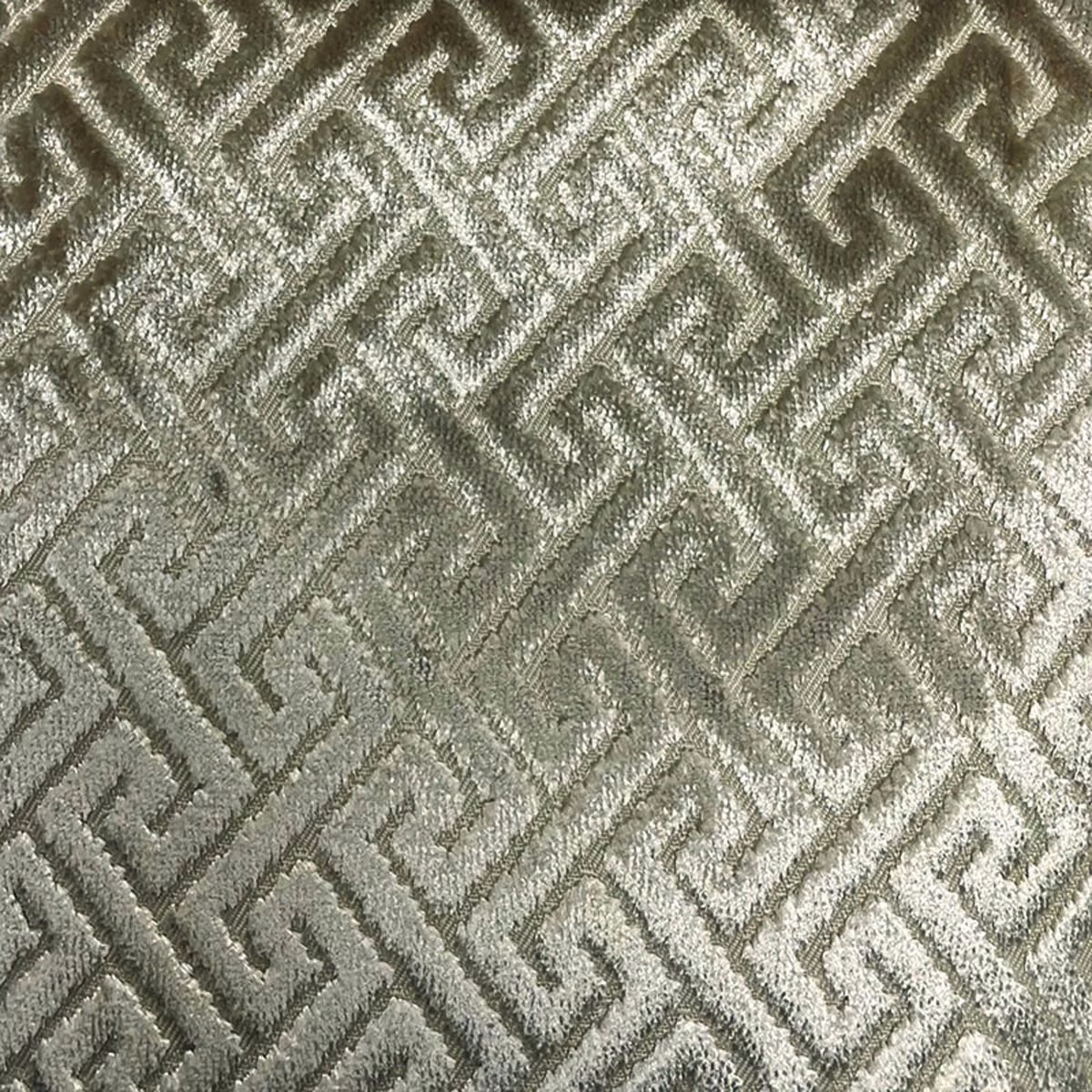 Muted sage-grey woven fabric with raised interlocking trellis lines and soft sheen