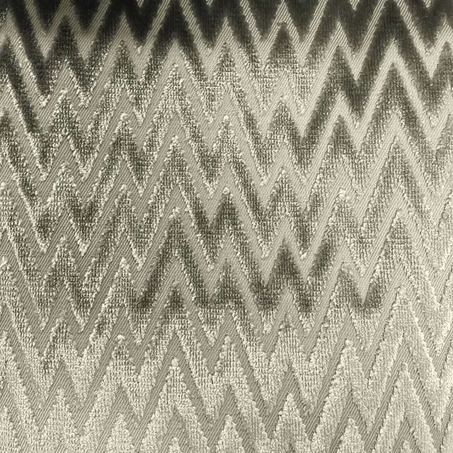 Stone grey and charcoal woven fabric with repeating textured zigzag chevrons