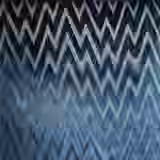 Denim-blue woven textile with charcoal and silver zigzag chevrons