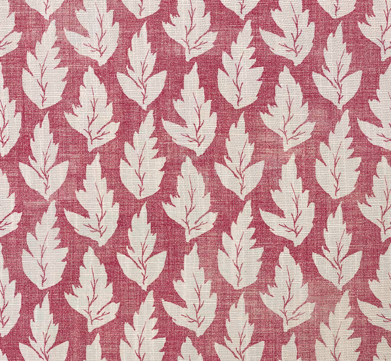 Muted raspberry woven ground with repeating ivory leaves and visible slub texture