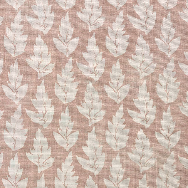 Dusty blush taupe woven fabric with repeating chalky ivory leaf motifs