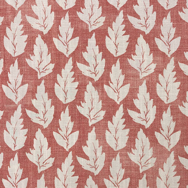 Muted terracotta woven fabric with repeating cream serrated leaf motifs and visible texture