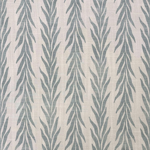 Cream woven ground with repeating cool blue-grey leafy stems and subtle texture