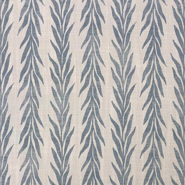 Oatmeal woven fabric with repeating blue-grey leafy sprigs in vertical rows