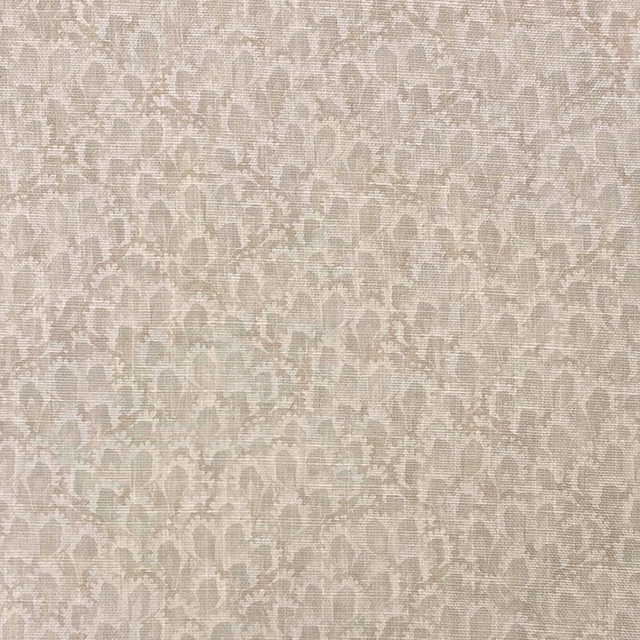 Soft mushroom-taupe woven fabric with small leafy motifs and creamy mottled highlights