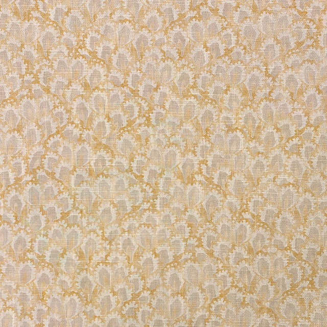 Warm ivory woven swatch with pale taupe leaves and muted ochre floral tracery