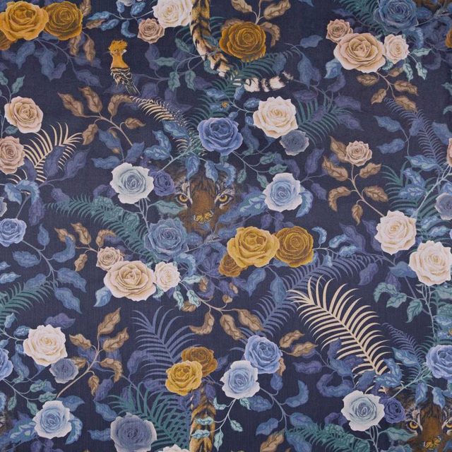 Midnight blue floral fabric with cream, blue and ochre roses and teal foliage
