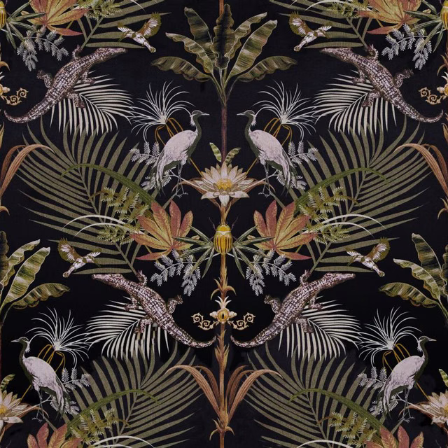 Near-black fabric with mirrored cranes, crocodiles and muted tropical foliage