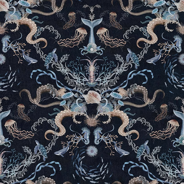 Inky navy sea-life fabric with mirrored seahorses, shells, jellyfish and coral motifs