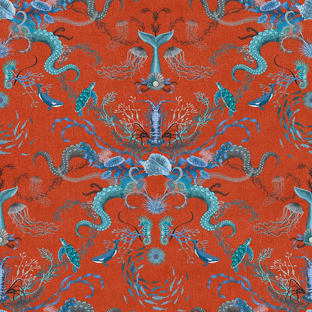 Coral-red textile with turquoise seahorses, fish, shells and branching sea-life motifs